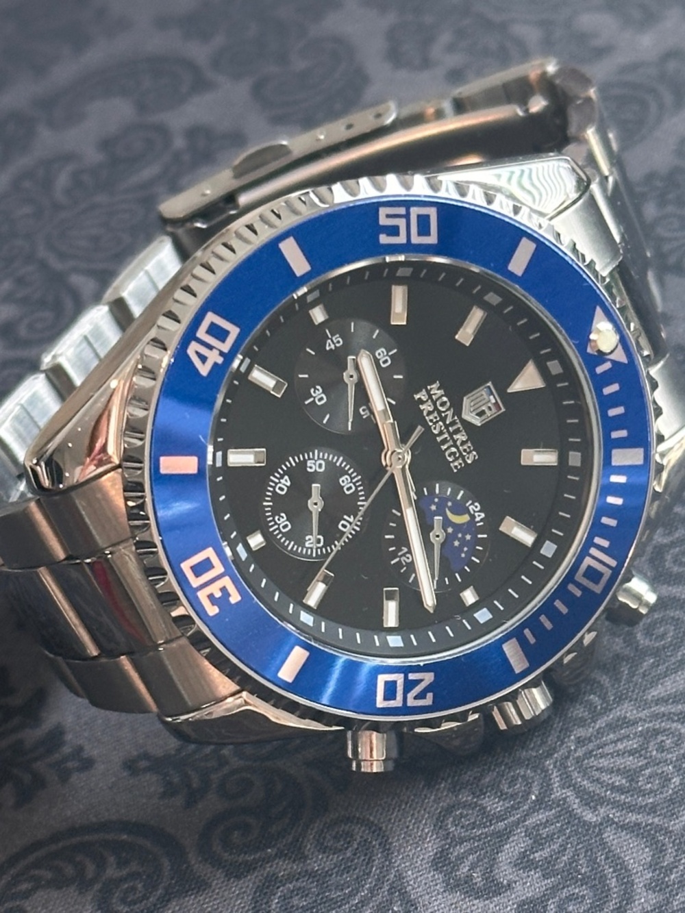 Montres Prestige Men’s Blue Bezel Stainless Steel Watch Needs Battery